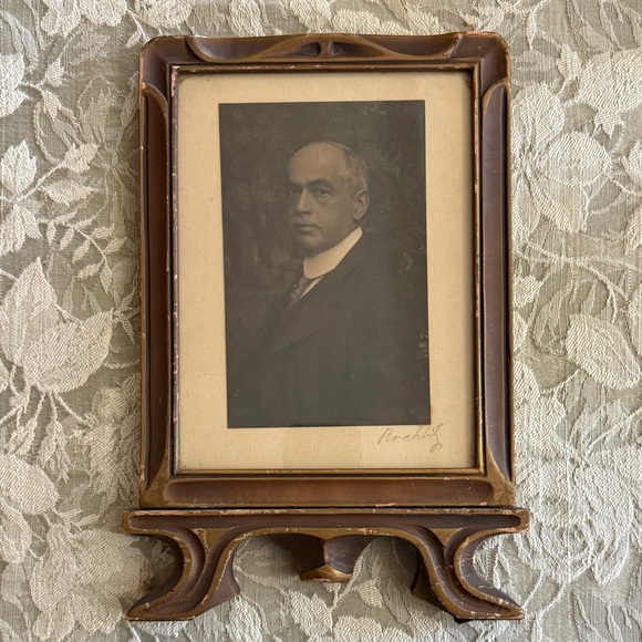 1900s black and white framed photograph in antique frame swivels frame
